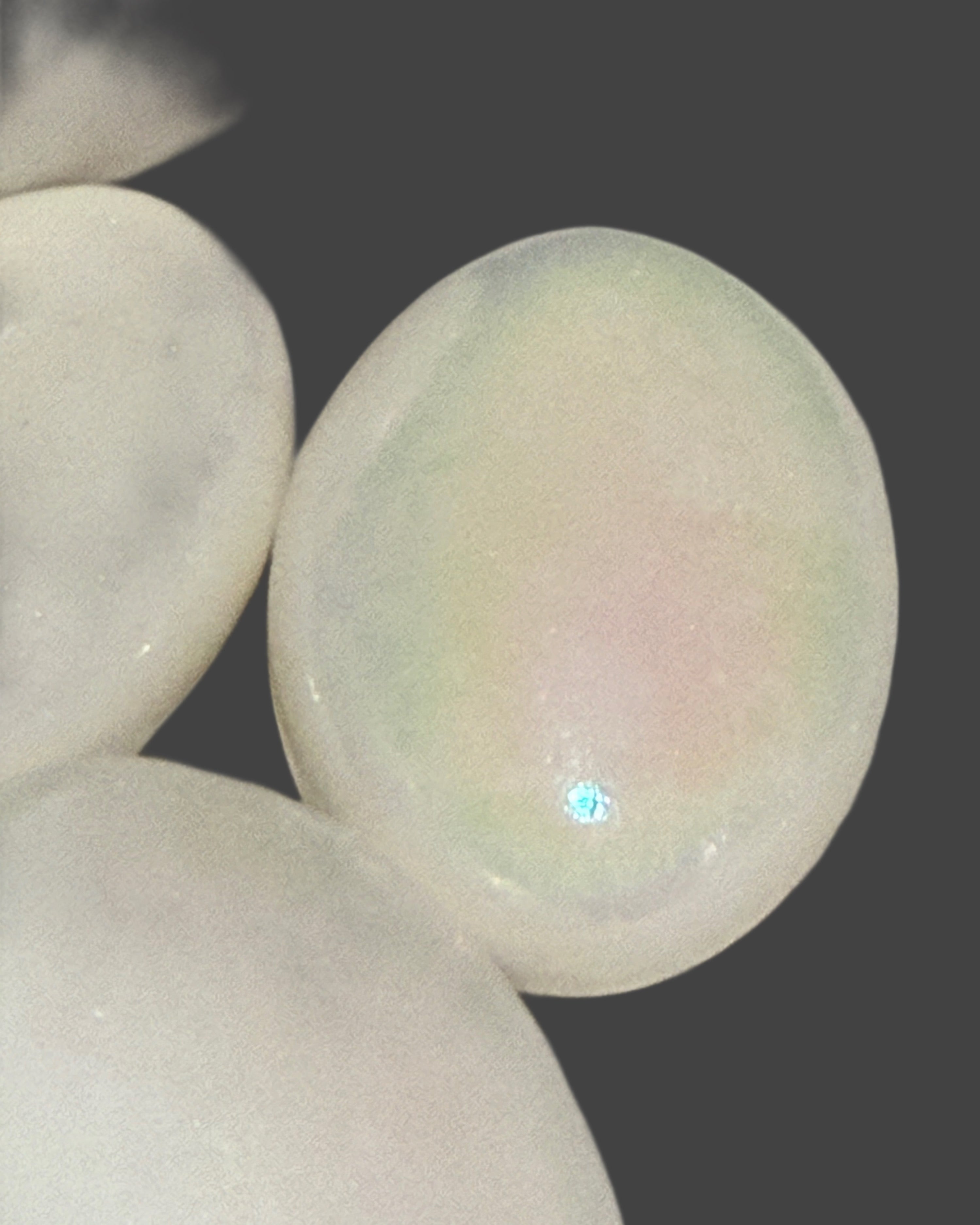 Aura Coated White Jade Palm Stone - 2 inches