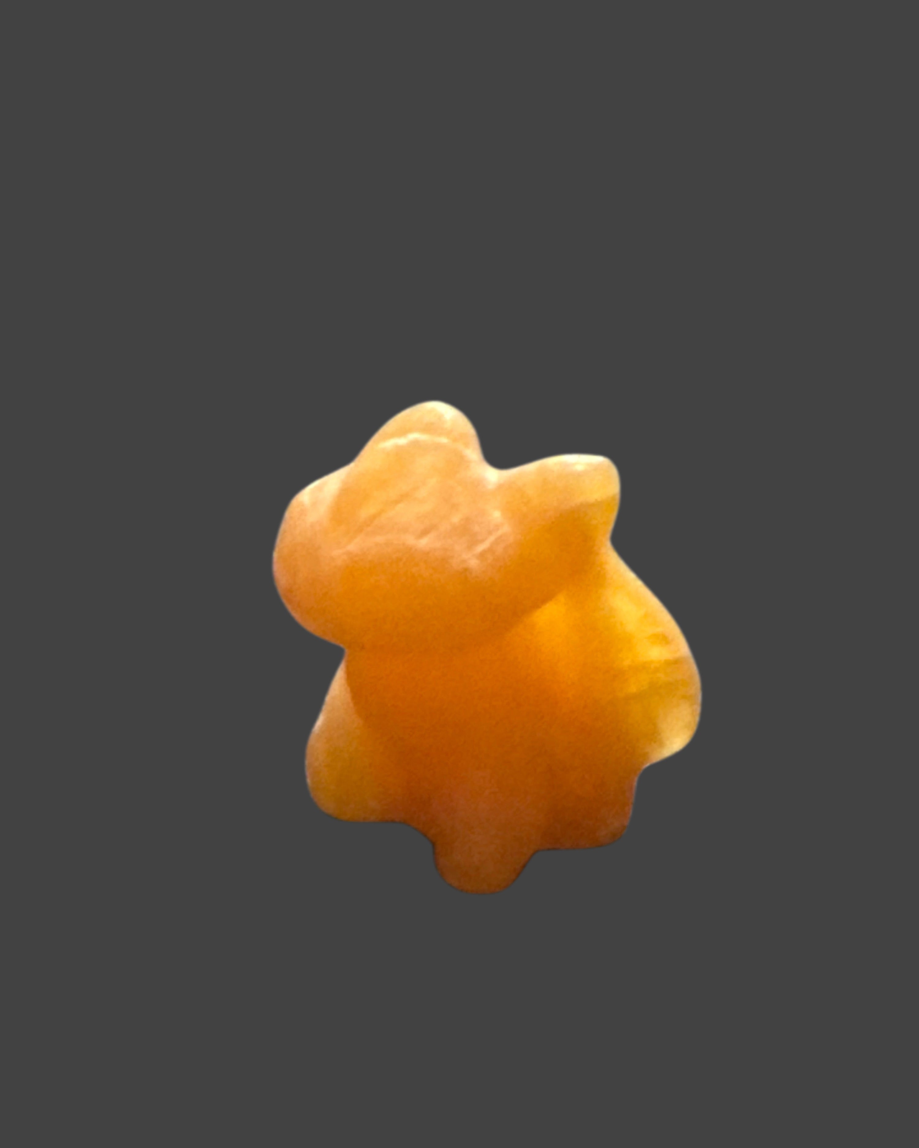 Orange Calcite Toothless Carving - 1 Inch